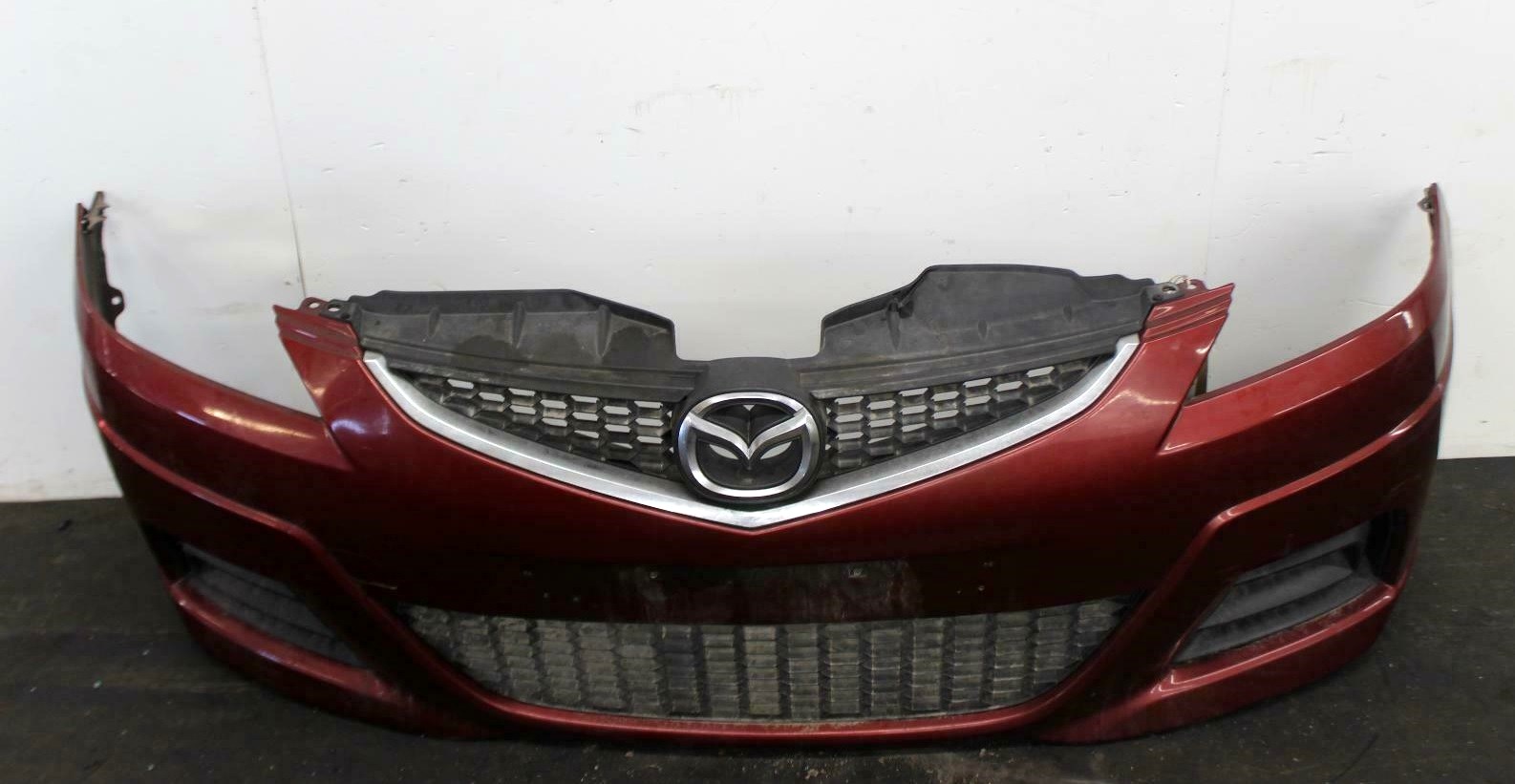 передний бампер Мазды