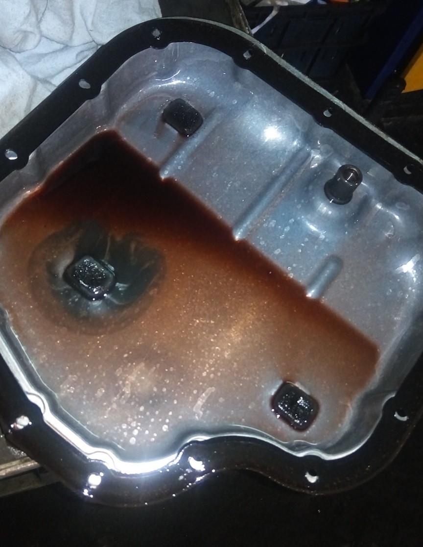 Отработанное масло в поддоне