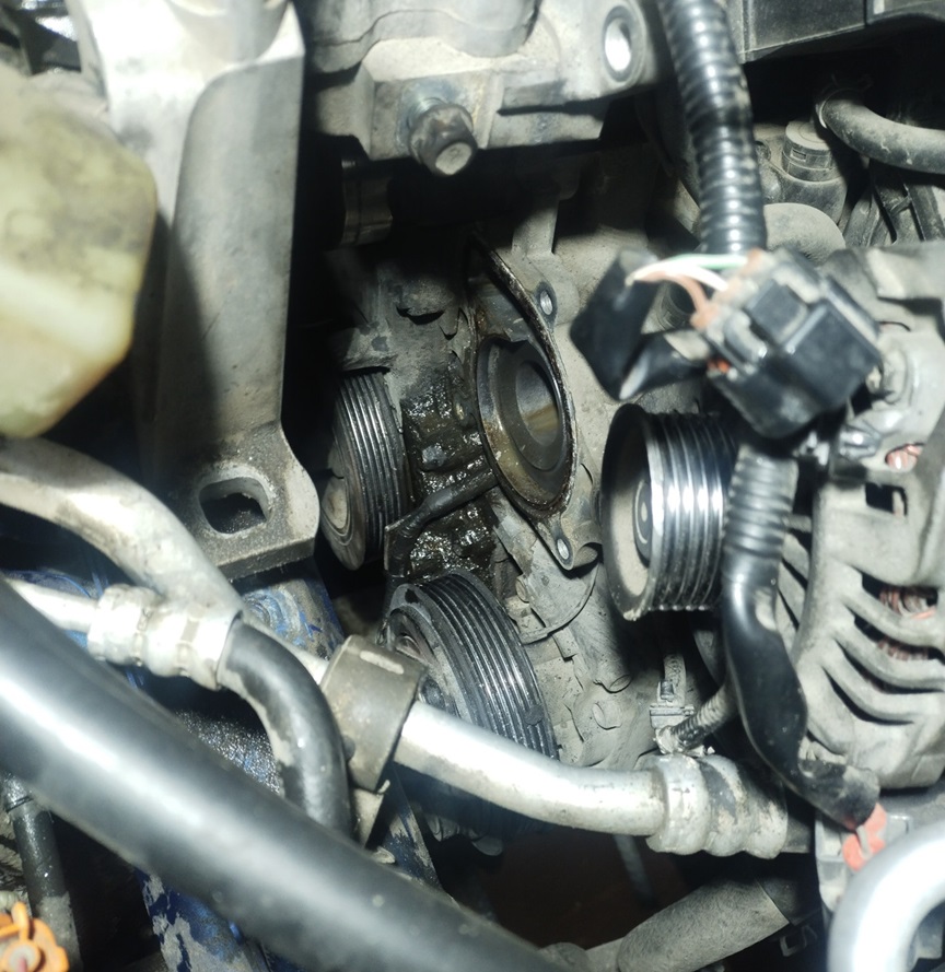 Замена помпы Мазда